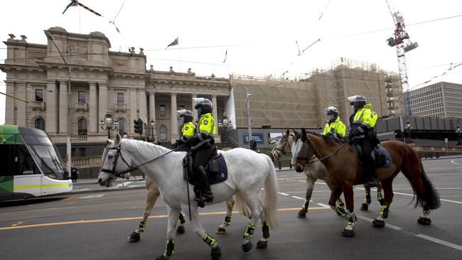 Police outside the Victorian parliament. Picture: David Geraghty