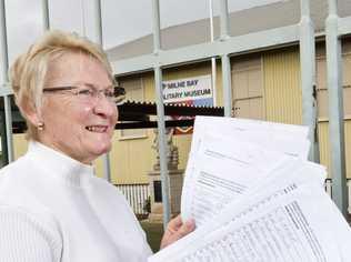 SUPPORTERS SIGN: Milne Bay Military Museum president Marian Jones with many signatures to save the museum. Thursday, 5th Jul, 2018. Picture: Nev Madsen