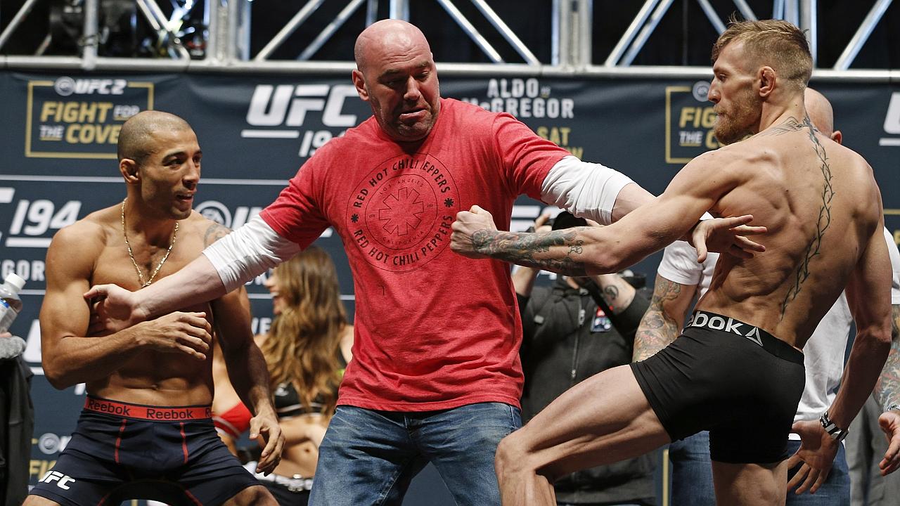 UFC 194 weigh-in video: Conor McGregor, Jose Aldo separated | Herald Sun
