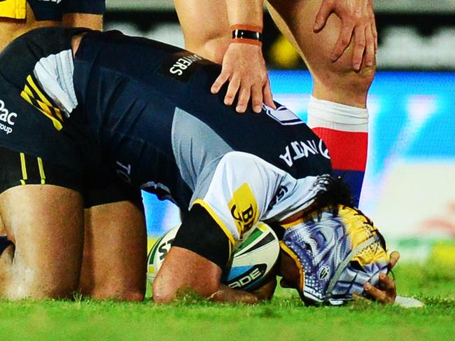 North Queensland Cowboys v Newcastle Knights from 1300 Smiles Stadium, Townsville. Cowboys Jonathan Thurston lies on the ground after being tackled. Picture: Zak Simmonds