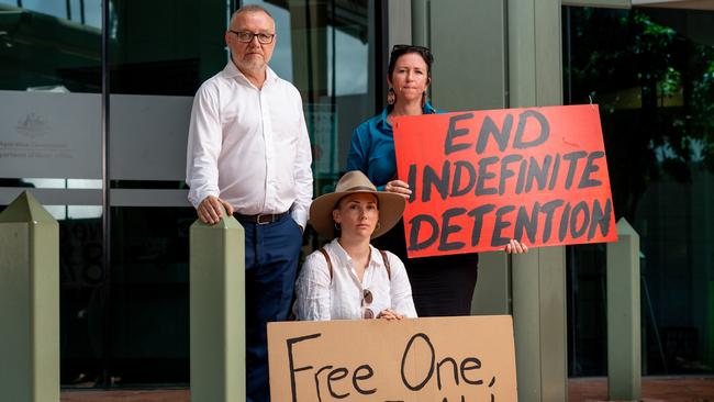 John Lawrence QC, Kat Mcnanara and Billie McGinley attempt to deliver a letter to the Department of Home Affairs at their office in Darwin. Photograph: Che Chorley