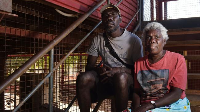 Cindy Jinmarabynana, who has taught at the college for 30 years with her son Isaiah Taylor, who was the first male graduate at the college in 2002, pose for a photo during the Maningrida College 60th Anniversary on Friday, August 10, 2018. Picture: Keri Megelus