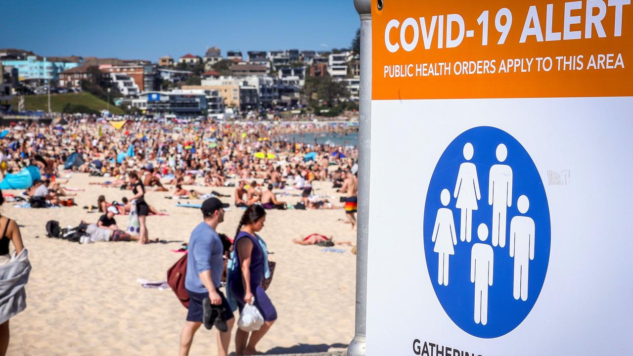 A sign informing people of social distancing measures at Bondi Beach. Picture: David Gray/AFP