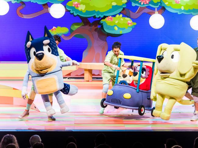 Puppeteers bring the Bluey characters to life on stage. Picture: Darren Thomas.