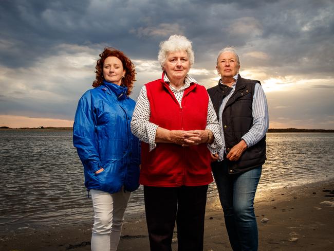 19/11/2019 Julie Jones with her mother Gloria Jones and Elizabeth Tregenza from the River Lakes and Coorong Action Group  at Sugars Beach on Hindmarsh Island looking back towards the Murray Mouth. Picture MATT TURNER.