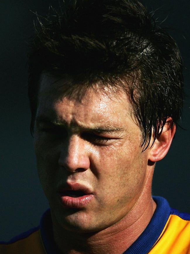 Ben Cousins takes a rest during the round seven AFL match between the Hawthorn Hawks and the West Coast Eagles at Aurora Stadium in 2005.