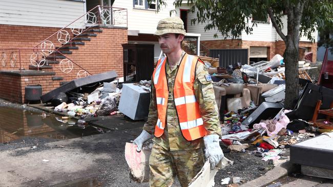 Defence help with the clean up from the Lismore floods. Picture: Jason O'Brien