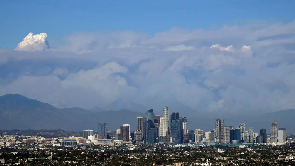 Los Angeles wildfire explodes, engulfing homes | The Cairns Post