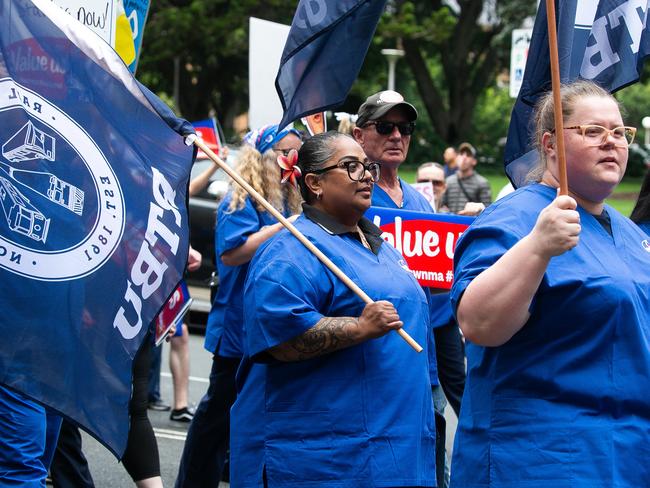 SYDNEY, AUSTRALIA : NewsWire Photos - NOVEMBER 13 2024; Nurses and midwives hold a 24-hour statewide strike, as frontline workers rally today. They march from Hyde Park down Elizabeth street to outside Parliament House in Sydney, with demands for fair wages, while patients across NSW will be left waiting. Picture: NewsWire / Gaye Gerard