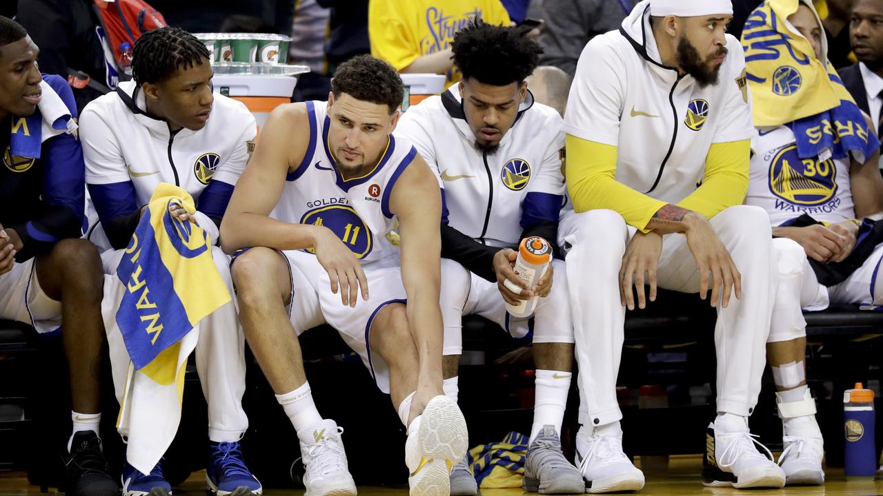 Golden State Warriors guard Klay Thompson sits on the bench in Game 1.