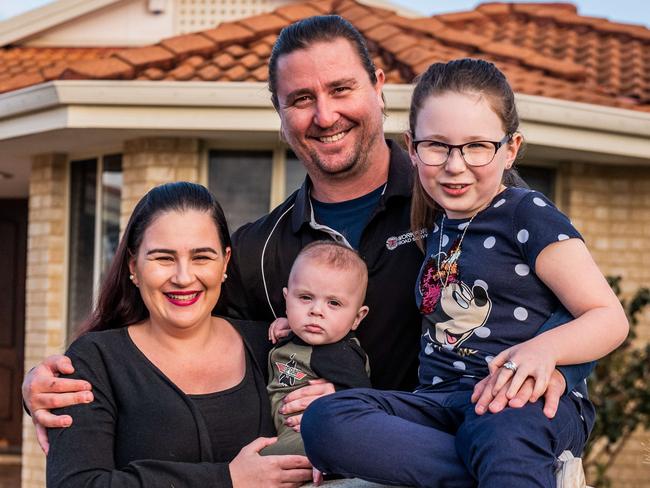 Ben and wife Elise Keeler with their children, Arabella (8) and Luka (4 months) at their rental property in Helena Valley near Perth today Monday July 13.Pic:Tony McDonough.