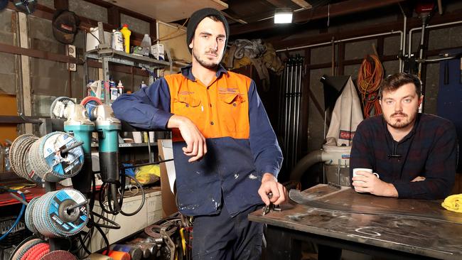 Underemployed Perth-based sculptor/handyman Sam Hopkins and events manager/offsider Lucas Swaan are riding the COVID job roller-coaster. Picture: Colin Murty