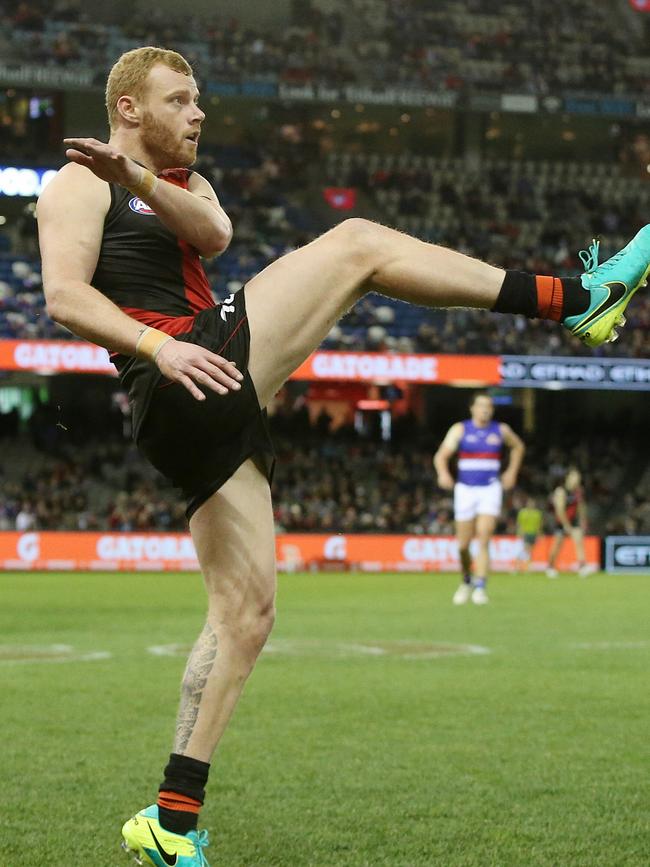 Adam Cooney launches Essendon forward during his last AFL game. Pic: Michael Klein