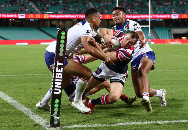 Brett Morris of the Roosters scores a try (Photo by Jason McCawley/Getty Images)