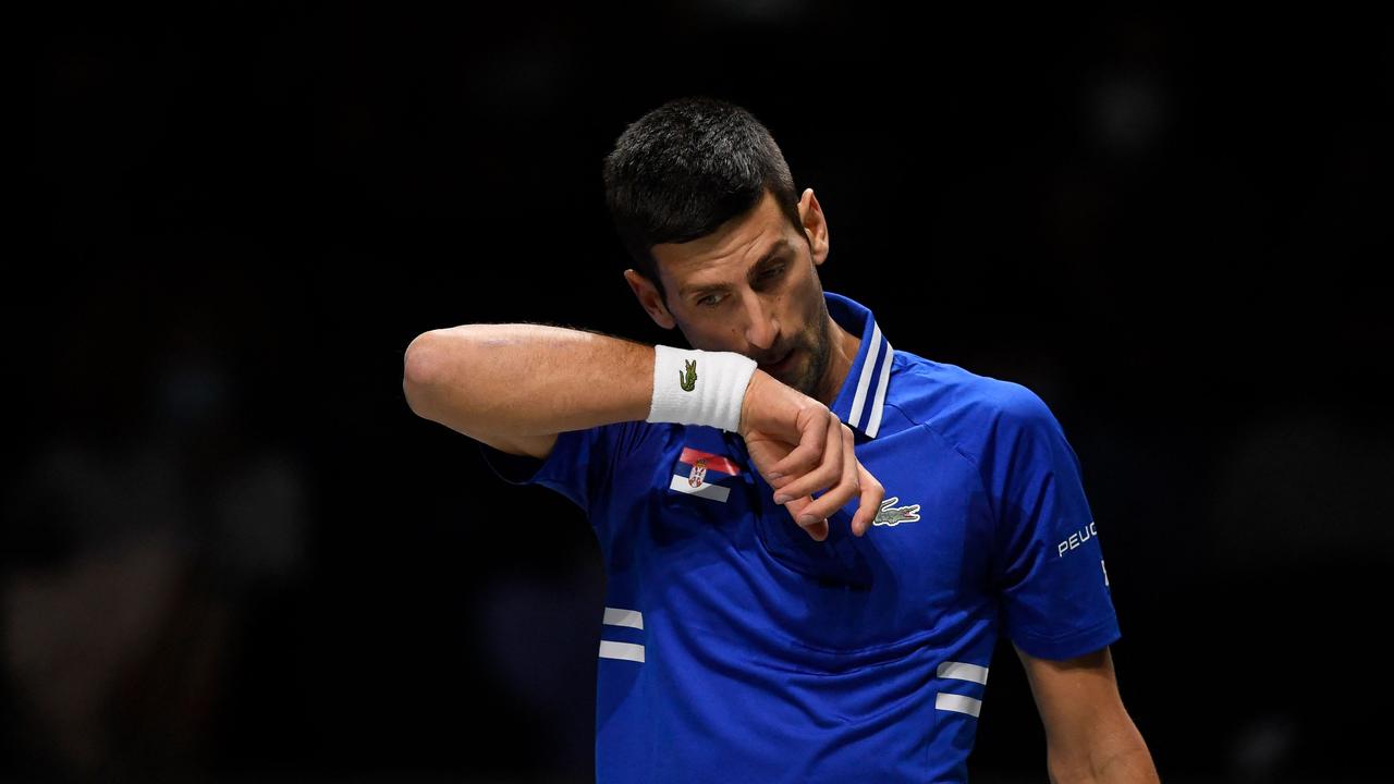 Djokovic is not through the door just yet. Photo by OSCAR DEL POZO / AFP