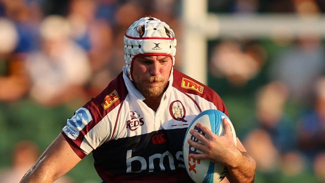 PERTH, AUSTRALIA - MARCH 01: Fraser McReight of the Reds is tackled during the round three Super Rugby Pacific match between Western Force and Queensland Reds at HBF Park, on March 01, 2025, in Perth, Australia. (Photo by Janelle St Pierre/Getty Images)