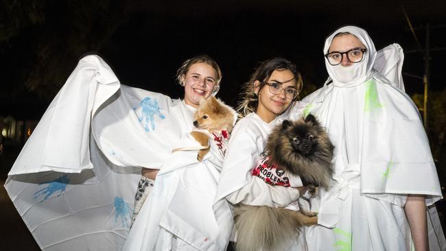 Trick or treating as ghosts are (from left) Haylee Galvin holding Daisy, Amelia Achilles holding Chewi and Leea Laurie on Halloween in Wilsonton, Sunday, October 31, 2021. Picture: Kevin Farmer