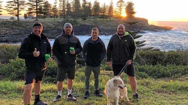 WALK THE TALK: Daymien Clydesdale, Alfie the Dog, Michael Park, Alex Leon and Mark Burns from The Man Walk. Picture: Contributed