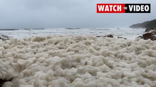 Mounds of sea foam covering Queensland beaches