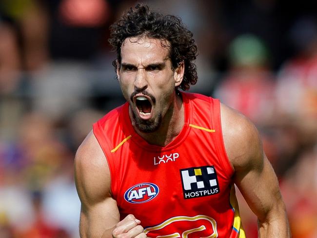 GOLD COAST, AUSTRALIA - MARCH 09: Ben King of the Suns celebrates a goal during the 2024 AFL Opening Round match between the Gold Coast SUNS and the Richmond Tigers at People First Stadium on March 09, 2024 in Gold Coast, Australia. (Photo by Russell Freeman/AFL Photos via Getty Images)