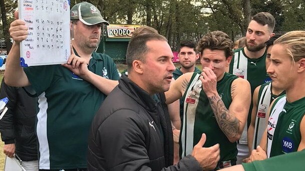 Devils coach Steve Cochrane works the huddle on Saturday. Picture: Wantirna South FC