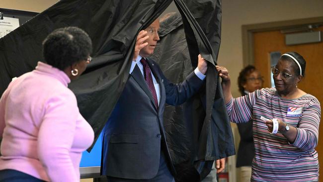 US President Joe Biden steps out of the booth after casting his early-voting ballot in New Castle, Delaware. Picture: AFP