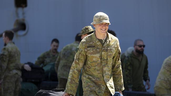 An Australian Army soldier from the 3rd Brigade disembark from HMAS Adelaide during the conclusion of exercise Indo Pacific Endevour at the Townsville Port, Townsville, QLD. PHOTO: PTE Jessica Gray