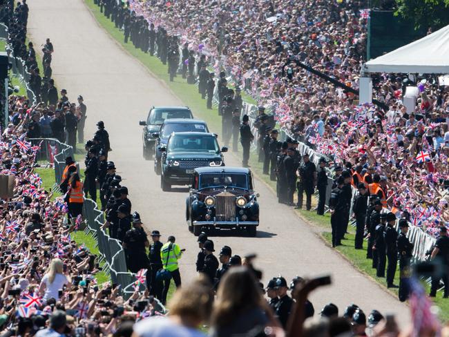 WINDSOR, ENGLAND - MAY 19:  Meghan, Duchess of Sussex arrives for the wedding of Prince Harry to Ms Meghan Markle at St George's Chapel, Windsor Castle on May 19, 2018 in Windsor, England. Prince Henry Charles Albert David of Wales marries Ms. Meghan Markle in a service at St George's Chapel inside the grounds of Windsor Castle. Among the guests were 2200 members of the public, the royal family and Ms. Markle's Mother Doria Ragland.  (Photo by Pool/Samir Hussein/WireImage)