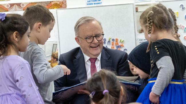 Prime Minister Anthony Albanese reads to children at an early learning centre in Melbourne.. Picture: David Geraghty / NewsWire