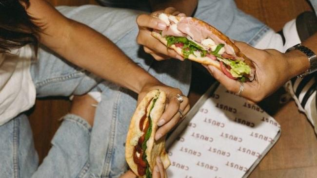 Crust Pizza is giving away 9000 of their brand-new Piadinas, or pizza sandwiches, in recognition of the day they have dubbed the Nation's Biggest Hangover.