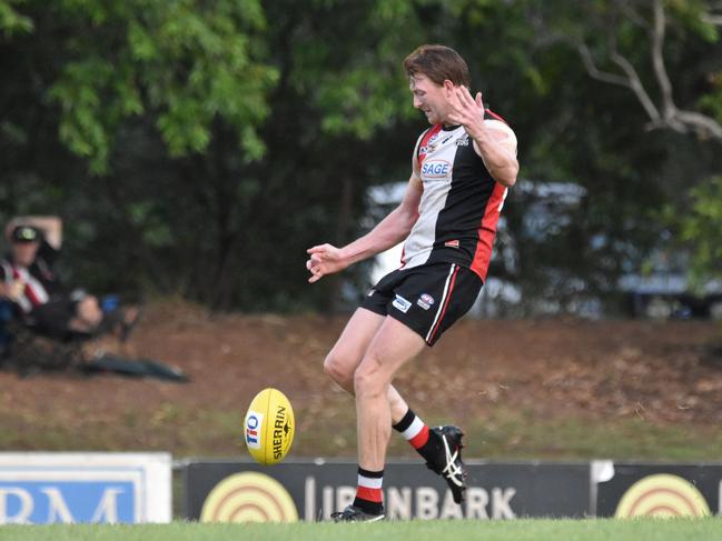 Andrew Boseley shoots for goal for Southern Districts.