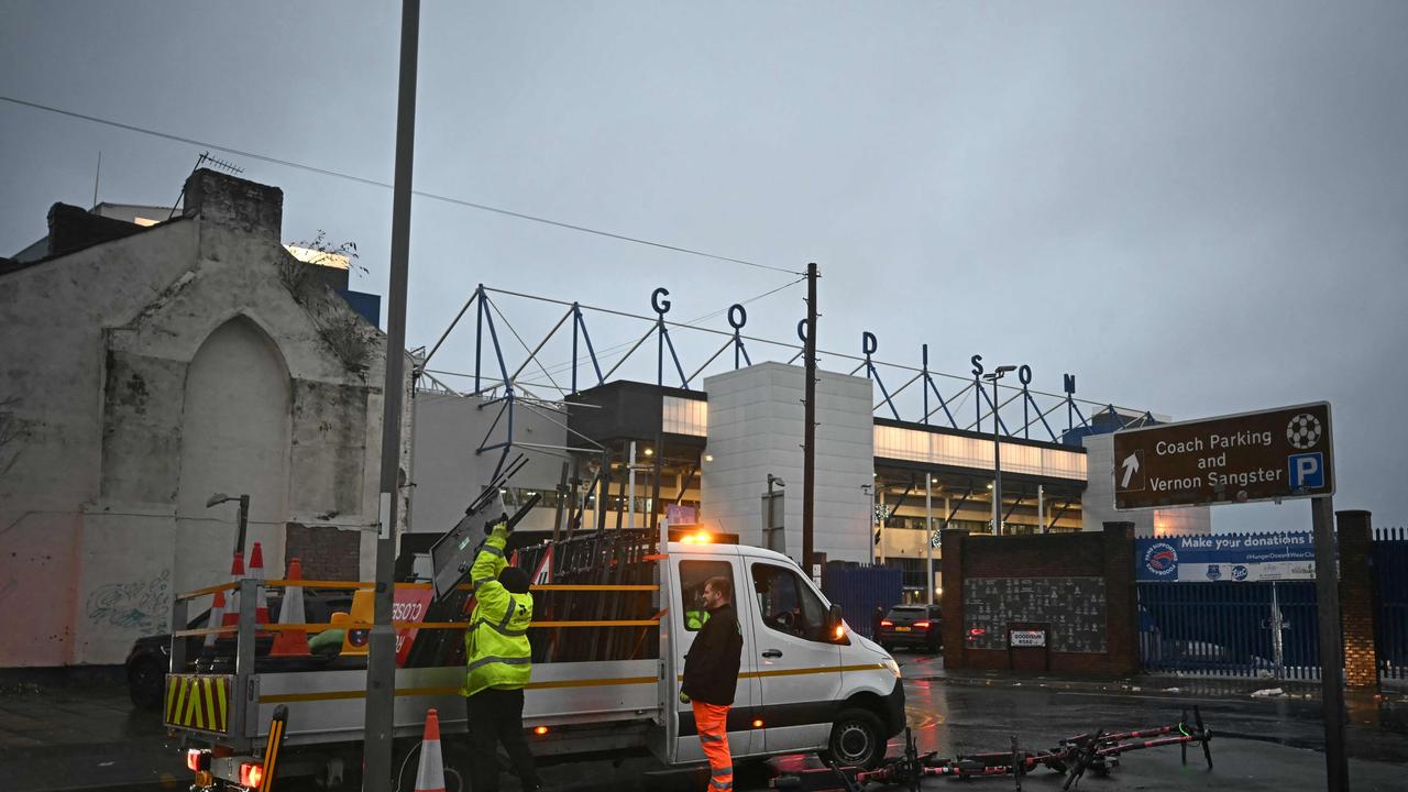 Premier League leaders Liverpool's Merseyside derby trip to Everton on Saturday was postponed due to adverse weather conditions caused by Storm Darragh. High winds and heavy rain have battered western parts of the United Kingdom, causing widespread travel disruption. (Photo by Paul ELLIS / AFP)