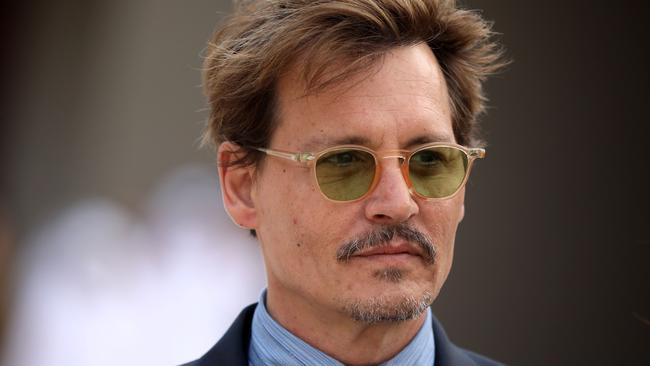 Johnny Depp attends the official opening ceremony of the National Museum of Qatar on March 27, 2019. 