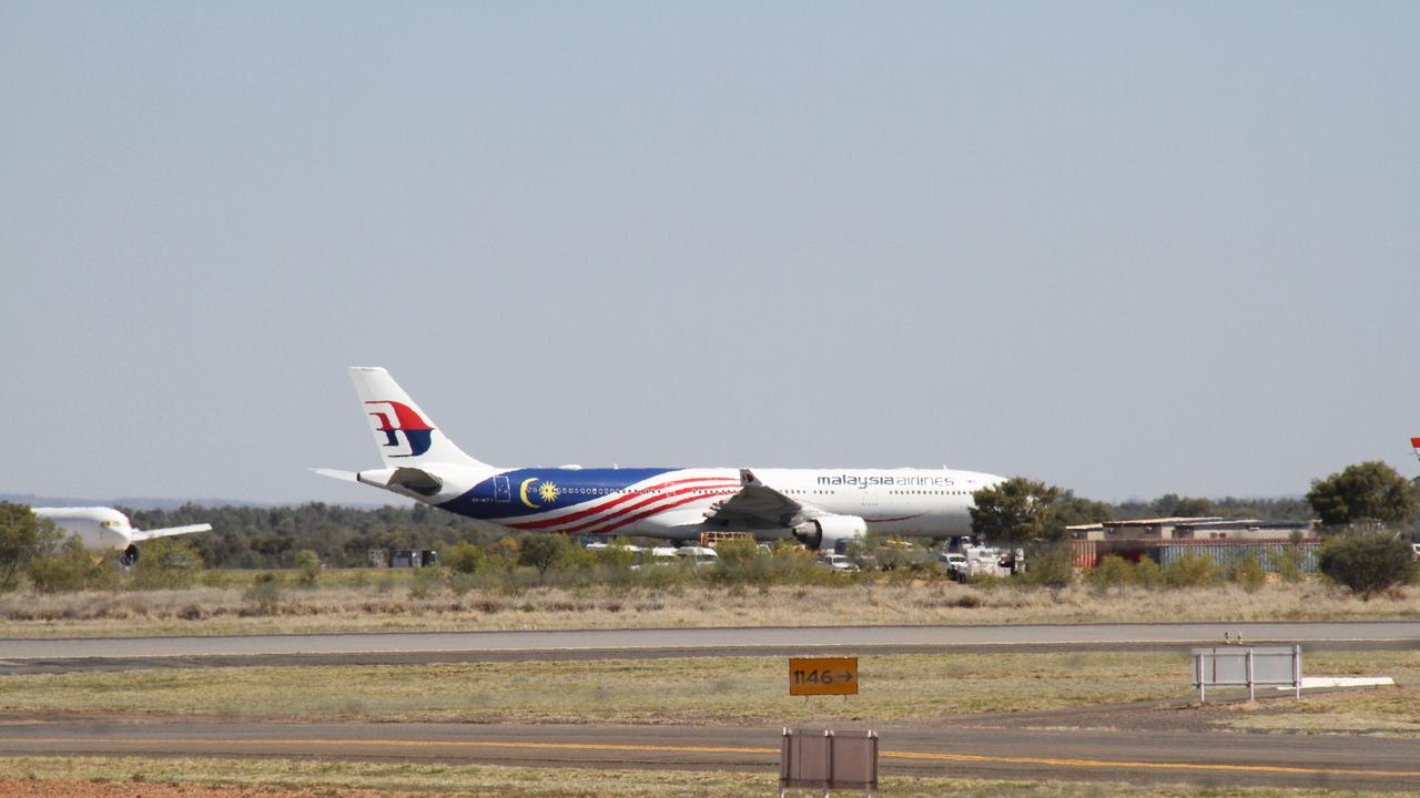 Malaysian Airlines flight MH128 at Alice Springs Airport Wednesday, August 21, 2024. PIcture: Gera Kazakov