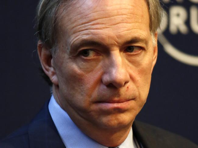 Raymond 'Ray' Dalio, billionaire and founder of Bridgewater Associates LP, pauses during a session on the opening day of the World Economic Forum (WEF) in Davos, Switzerland, on Wednesday, Jan. 22, 2014. World leaders, influential executives, bankers and policy makers attend the 44th annual meeting of the World Economic Forum in Davos, the five day event runs from Jan. 22-25. Photographer: Jason Alden/Bloomberg *** Local Caption *** Raymond Dalio