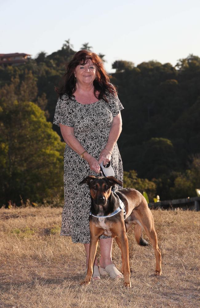 Colleen James from Tugun with rescue dog Echo who saved her son from the 1.5-metre brown snake. Picture: Glenn Hampson