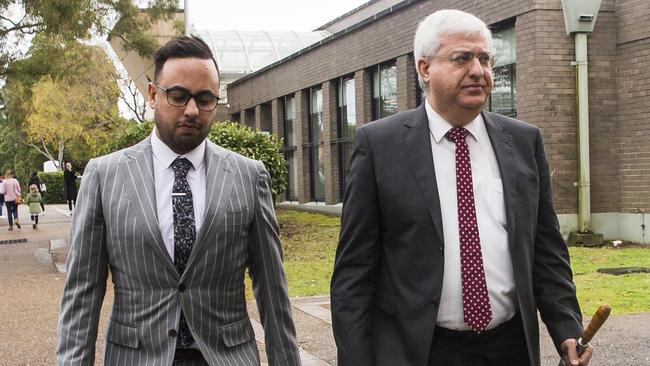 Craig Kelly’s office manager Frank Zumbo (right) with his lawyer Michael Moussa. Picture: Dylan Robinson