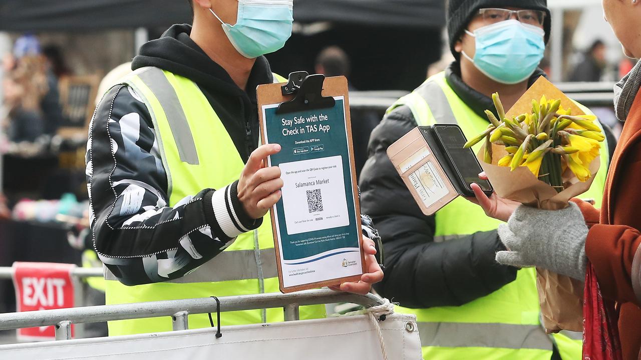 Tasmania's Own Market/Salamanca Market with some people wearing masks and people using the check in Tas app to register attendance. Picture: Nikki Davis-Jones