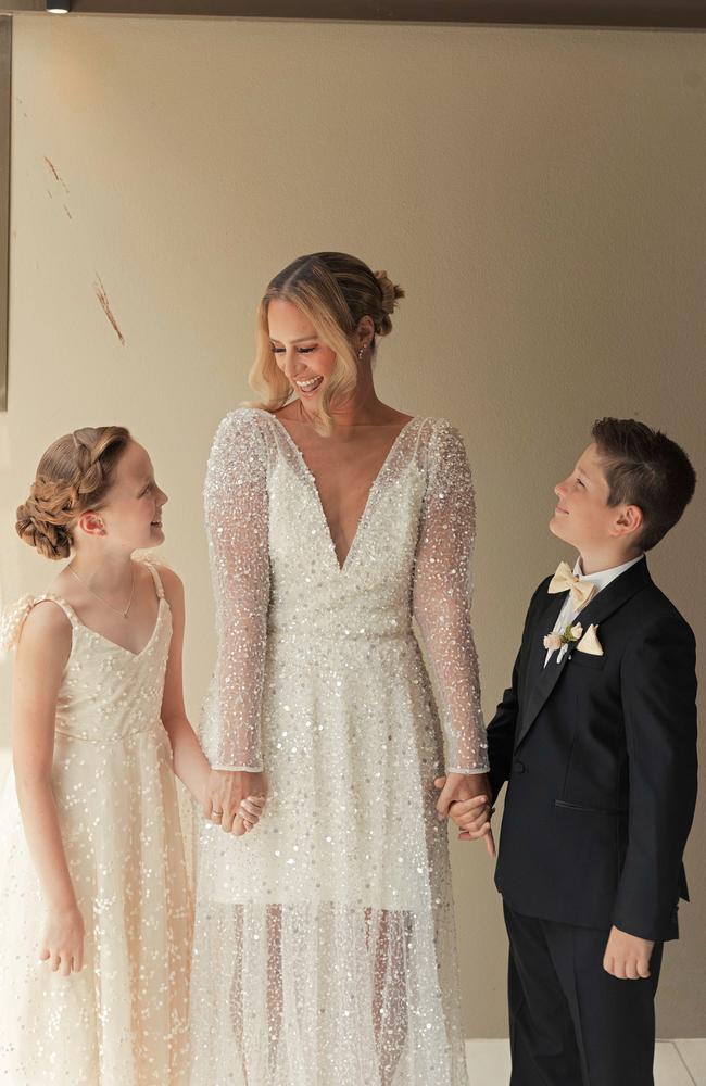 Alex Hyndman Hill and her children on her wedding day in 2022.