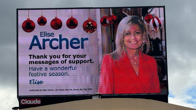 Christmas message billboard by Elise Archer above Winston Hotel, Elizabeth Street, North Hobart. Picture: Craig Herbert.