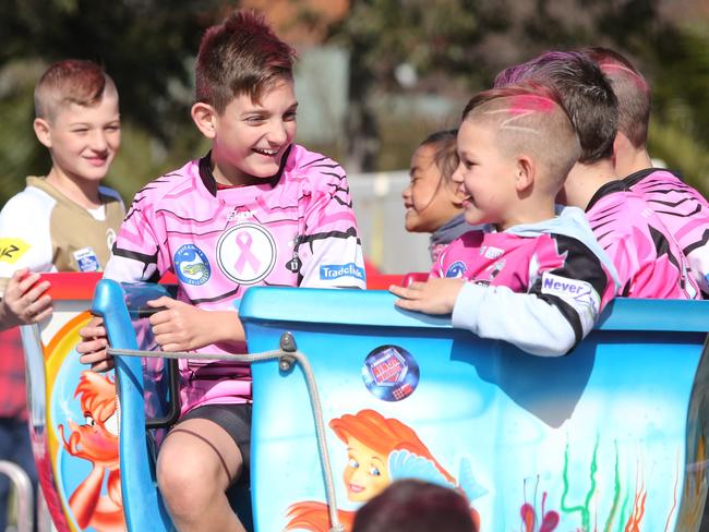 Children enjoying the tea cup rides.