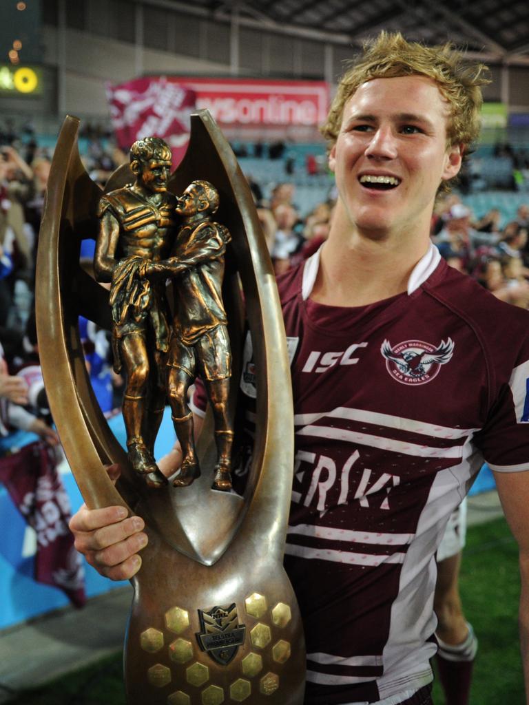 DCE with the 2011 premiership trophy. Picture: AAP/Dean Lewins