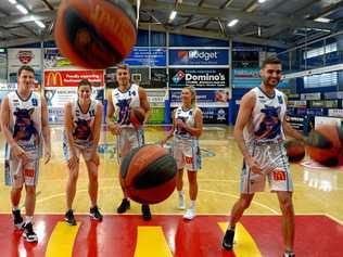 Rockhampton basketballers Shaun Bruce, Jacinta Vandenberg, Nelson Kahler, Brooke Blair and Jimmy Mitchell model the new Project Booyah kit. Picture: Jann Houley