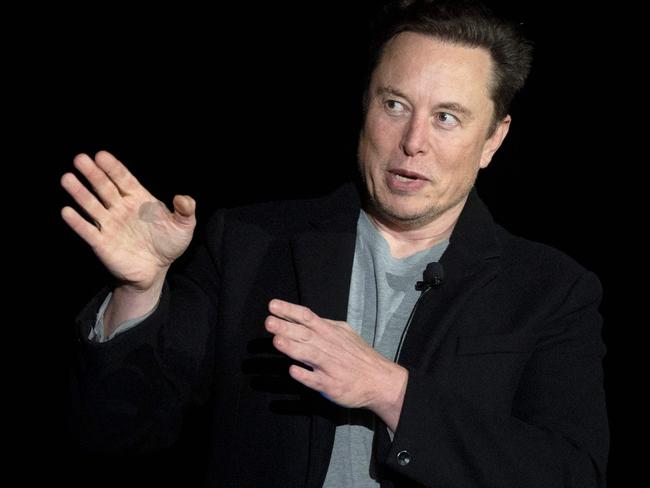 (FILES) In this file photo taken on February 10, 2022 Elon Musk gestures as he speaks during a press conference at SpaceX's Starbase facility near Boca Chica Village in South Texas. - Elon Musk late Tuesday said he will resign as chief executive of Twitter once he finds a replacement, in apparent respect of a poll he himself launched that revealed users wanted him to step down.  "I will resign as CEO as soon as I find someone foolish enough to take the job!" Musk tweeted, saying he will then run software and server teams at Twitter. (Photo by JIM WATSON / AFP)