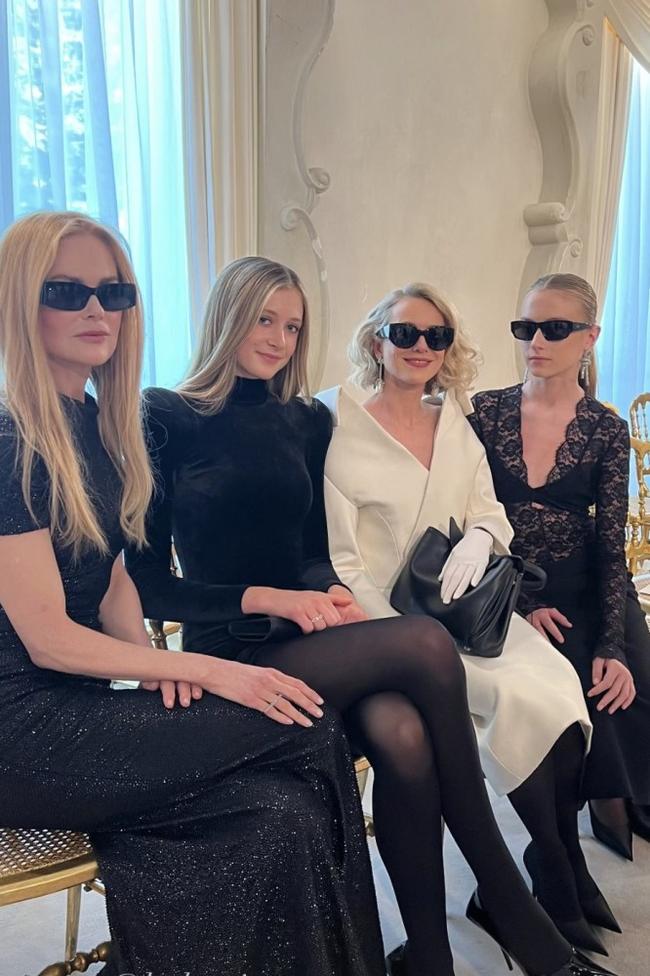 Naomi Watts and Kai SchreiberAt the same Balenciaga show, newly minted brand ambassador Naomi Watts was accompanied by her daughter, Kai Schreiber, and looked like a modern-day Capote ‘swan’ in an outré white skirt-suit from the maison.