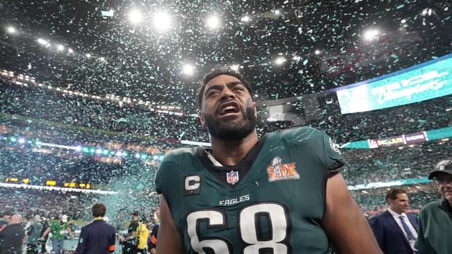 The success of Jordan Mailata, pictured here celebrating after defeating the Kansas City Chiefs in the NFL Super Bowl in February, will further focus US high schools and ­colleges on young Aussie players. Picture: AP Photo/Doug Benc