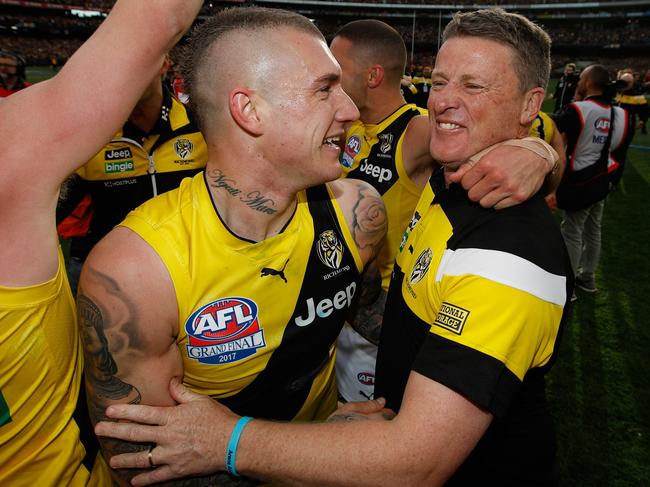 MELBOURNE, AUSTRALIA - SEPTEMBER 30: Dustin Martin of the Tigers and Damien Hardwick, Senior Coach of the Tigers celebrate during the 2017 Toyota AFL Grand Final match between the Adelaide Crows and the Richmond Tigers at the Melbourne Cricket Ground on September 30, 2017 in Melbourne, Australia. (Photo by Michael Willson/AFL Media/Getty Images)