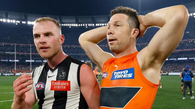 MELBOURNE, AUSTRALIA - SEPTEMBER 22: Tom Mitchell of the Magpies is seen with Toby Greene of the Giants during the 2023 AFL First Preliminary Final match between the Collingwood Magpies and the GWS GIANTS at Melbourne Cricket Ground on September 22, 2023 in Melbourne, Australia. (Photo by Dylan Burns/AFL Photos via Getty Images)