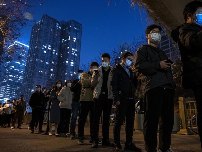 People line up for Covid tests in Beijing. Picture: Kevin Frayer/Getty Images