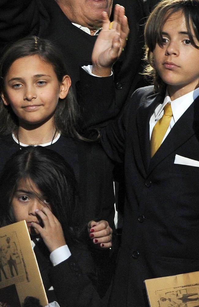 Michael Jackson's daughter Paris Michael Katherine Jackson (L) and two sons Prince Michael Jackson II (also known as Blanket) and Prince Michael Jackson I (R) at a memorial service for their father in 2009. Picture: Supplied